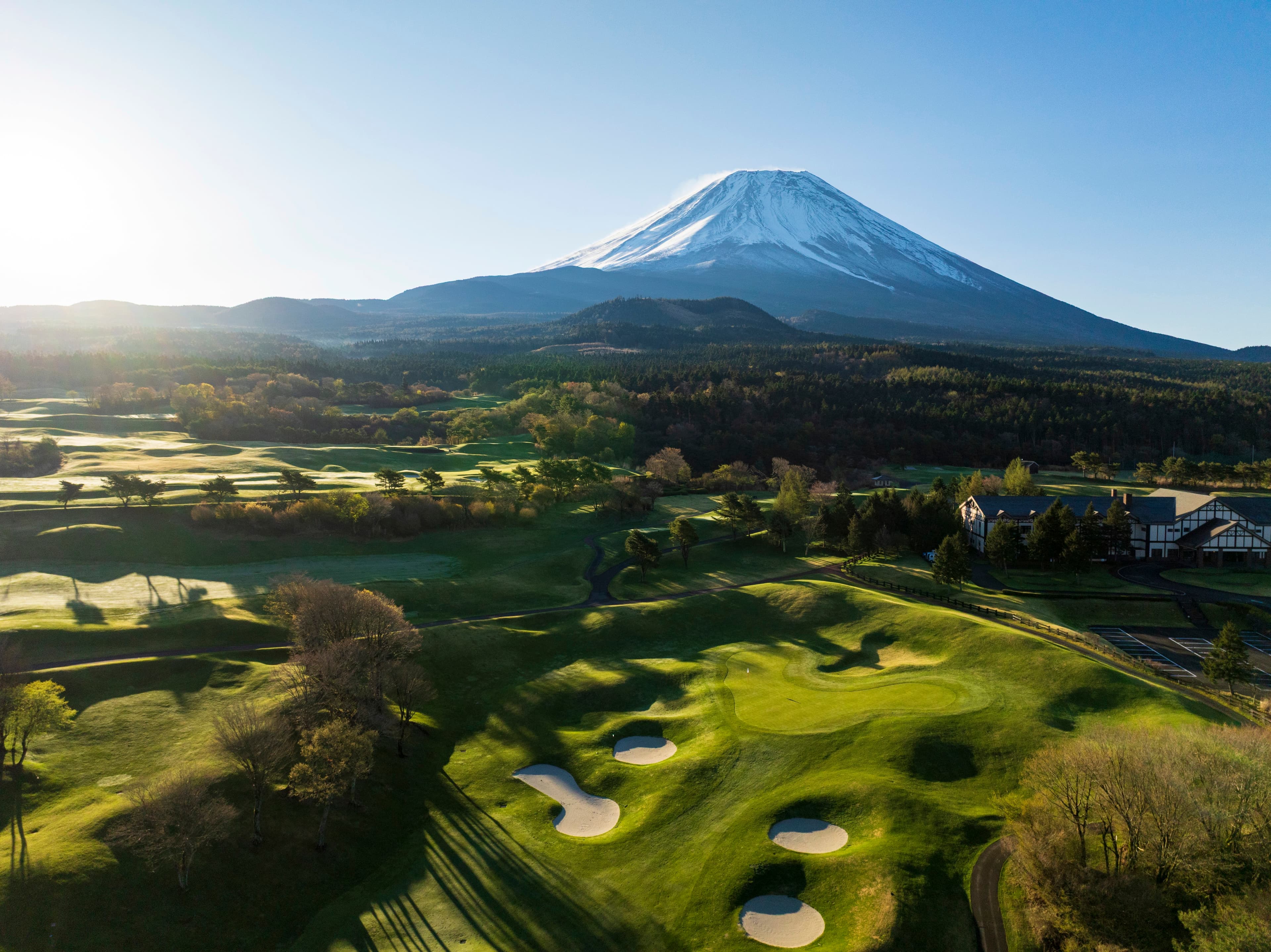 Aerial view of the Fuji Classic course and clubhouse at the foot of Mount Fuji