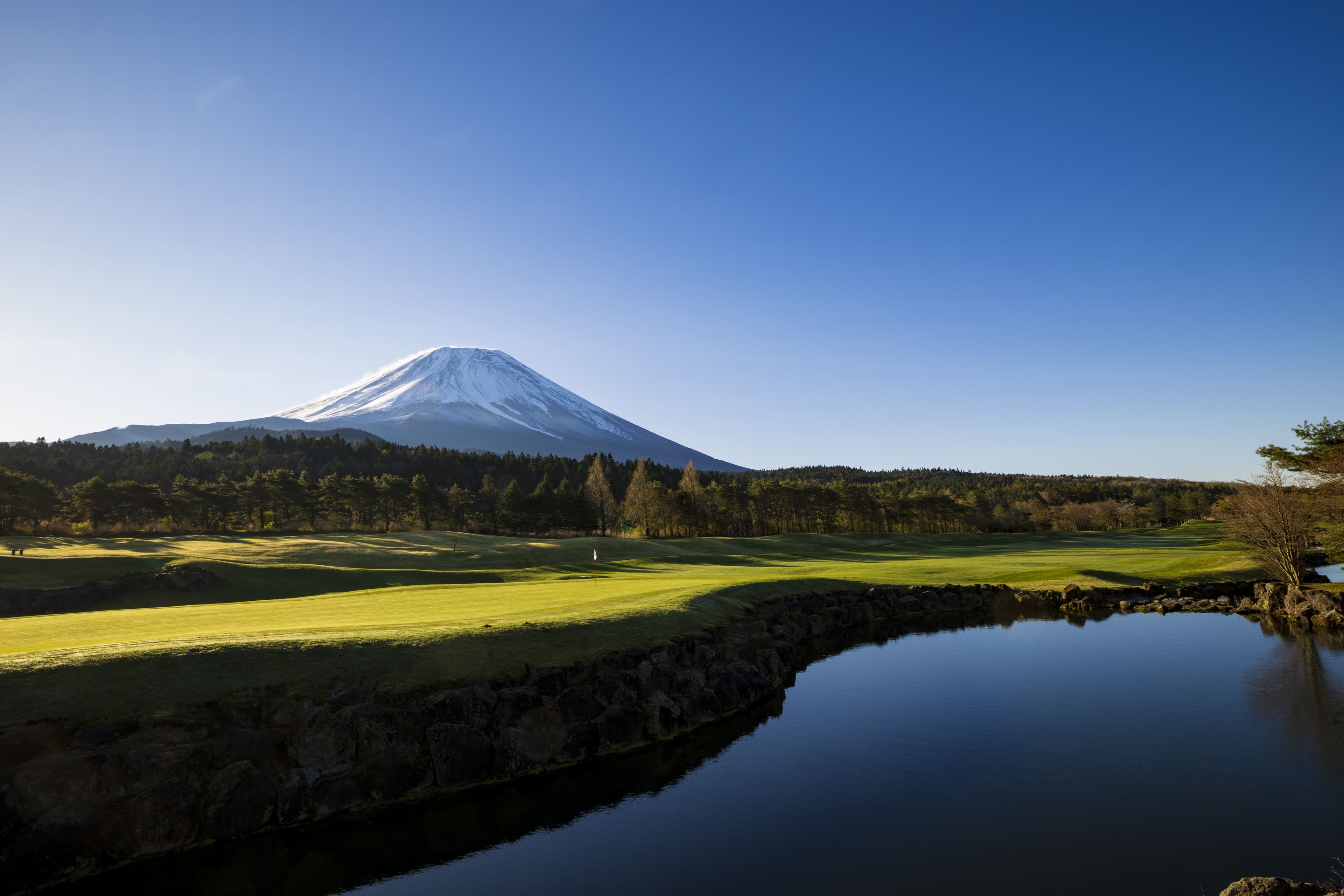 Mt. Fuji rising over the course pond at Fuji Classic